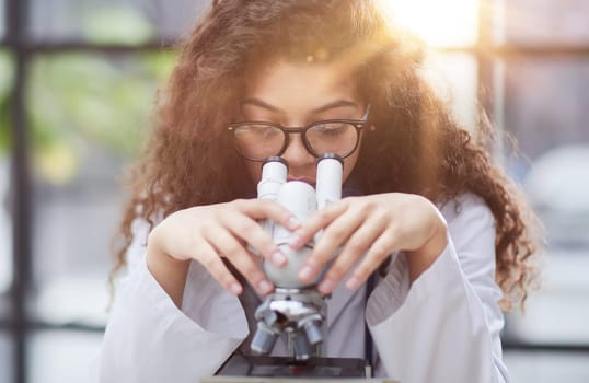 Female scientist researcher conducting an experiment in a labora