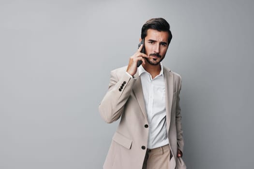 man business businessman mobile phone selfies smartphone corporate guy smile suit portrait young handsome phone hold cell beard communication connection call happy