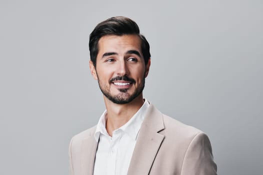 white man standing smiling stylish person business eyeglass crossed suit shirt portrait beige happy handsome arm copyspace businessman tie successful guy