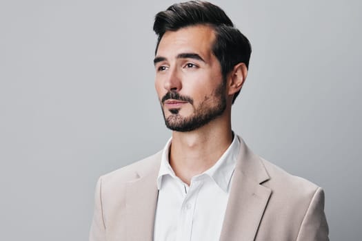 young man business folded corporate beige handsome businessman crossed white executive portrait eyeglass confident attractive copyspace occupation happy suit smiling fashion