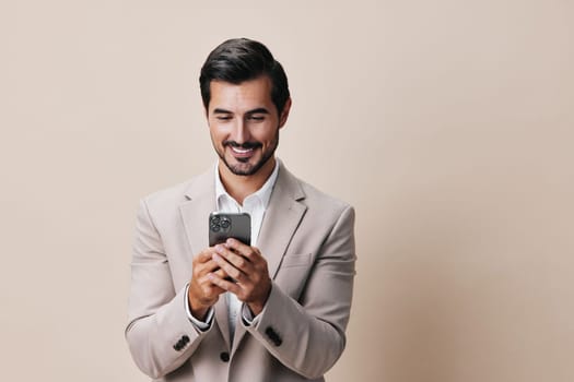 isolated man business hold communication corporate suit smartphone space male call success holding selfies adult phone smile portrait beard copy happy message