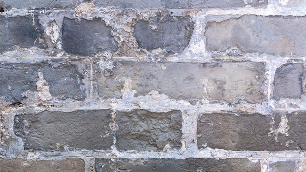 Real gray antique retro brick tone, pattern wall background in an old chinese house, close up, flat lay, top front view.