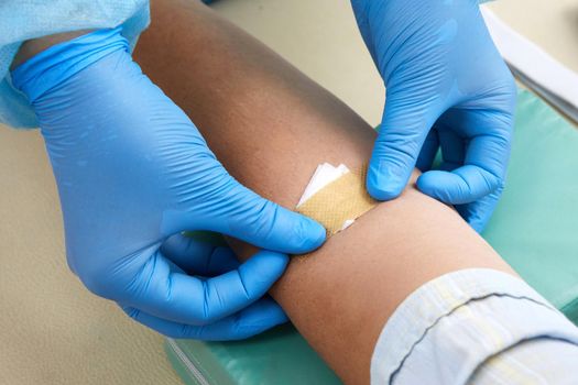 Nurse doing blood test from vein. Covid testing concept
