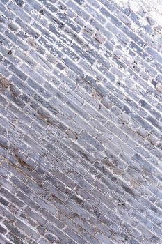 Real gray antique retro brick tone, pattern wall background in an old chinese house, close up, flat lay, top front view.
