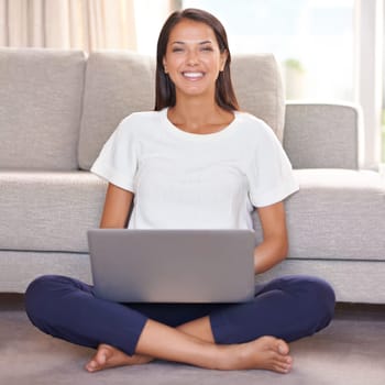 Smile, laptop and portrait of woman on home floor with internet for streaming online. Happy female person relax in lounge for remote work, studying and research or email for for social media or blog.