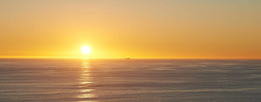 Sky, sunset and sea at morning on the horizon with ocean and waves landscape. Sunrise background, calm weather and summer by the beach with coastline and outdoor environment with mockup in nature.