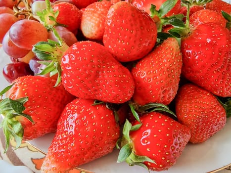 Red ripe strawberries background. Close up