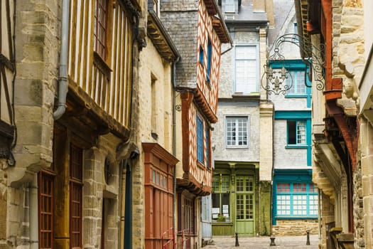 Medieval street with typical half-timbered houses in the French town of Vitre.