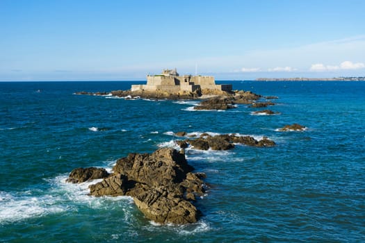 View of the National Fort in the medieval city of Saint Malo on a sunny summer day and clear sky.