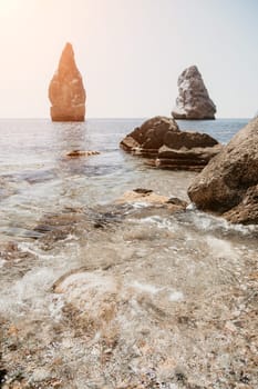 Aerial panoramic view of beautiful sunset above sea. Beautiful seascape. Sun glare, small waves on the water surface. Evening. Horizon. Nobody. No people. Copy space. Never-ending beauty of nature