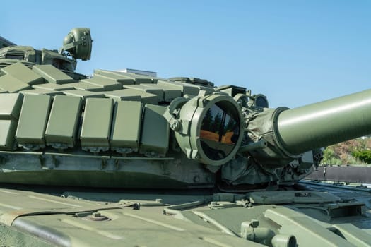 the barrel of the tank against the blue sky. photo