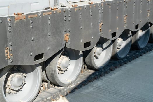 caterpillar track of military armored vehicles close-up. photo