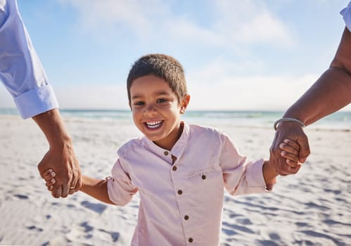 Holding hands, beach or portrait of a happy kid walking on a holiday vacation together with happiness. Parents, mother and father playing or enjoying family time with a young boy or child in summer.