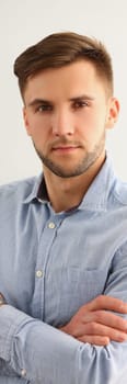 Portrait of handsome young attentive focused businessman in shirt. Business consultant manager or boss concept