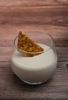 Bavarian recipe with pear and vanilla served with almond nougatine. High quality photo
