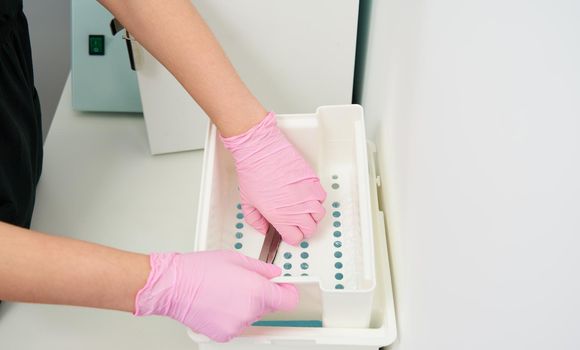 Sterilizing box. Sterilization of instruments and tools. Sterilization procedure. Steam autoclave.