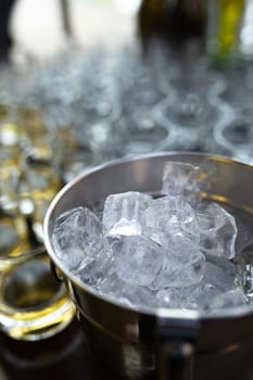 close-up of a metal ice bucket for cooling drinks.