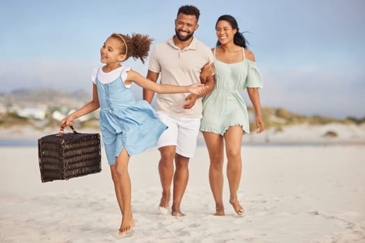 Happy family, parents or child walking on beach to relax on fun holiday vacation or picnic together. Dad, mom or excited young girl bonding, smiling or holding basket outdoors in summer at seashore.