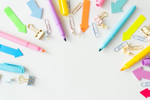 Stationery, school supplies on a white table in bright pastel colors