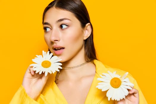 woman brunette bouquet person chamomile stylish beautiful pretty flower positive smile young day day model woman isolated yellow portrait face beauty happiness valentines