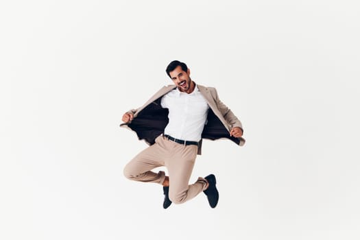 man stylish jumping business beige beard professional adult running flying success isolated happy businessman shirt work winner model suit smiling victory