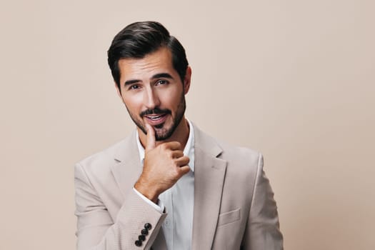 man suit happy occupation business copyspace standing tie background guy beard crossed smiling young beige white businessman entrepreneur portrait handsome isolated