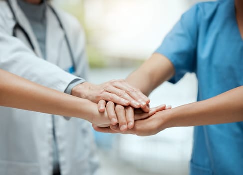 Stack, teamwork or hands of doctors with collaboration for healthcare goals in meeting or community. Closeup, team building or medical nurses with group support, motivation or mission in hospital.