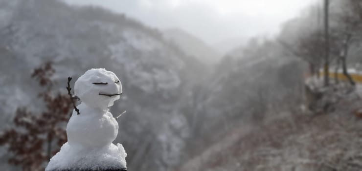 art,snowman,winter,sculpture,snow,photography,cloud,freezing,mountain,sky