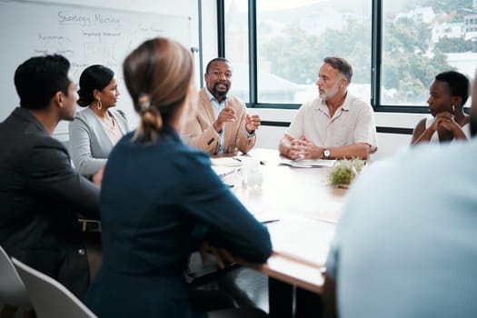 Business people, coaching and meeting for strategy, brainstorming or planning at office workshop. Group of employees in team discussion, collaboration or project management in conference at workplace.