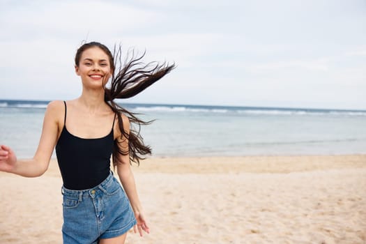 woman summer beach fun young sea copy smiling smile sunrise sun sand running beauty lifestyle travel sunset beautiful happiness water girl space