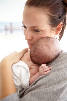 Family, hug and mother with a baby, love and sleeping with care, bonding and loving together. Mama, infant and toddler embrace, rest and relax with child development, newborn and support with safety.