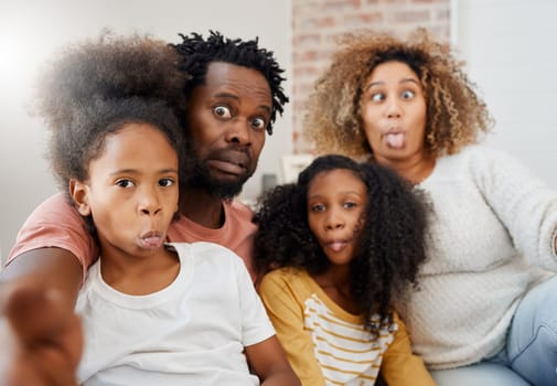 African family, selfie and funny face in portrait at home with bond, care or relax with social media app. Happy father, mother and daughters together for profile picture, comic photography and joke.