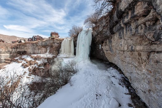 A large frozen waterfall. 3 cascading waterfall in Dagestan.republic of dagestan