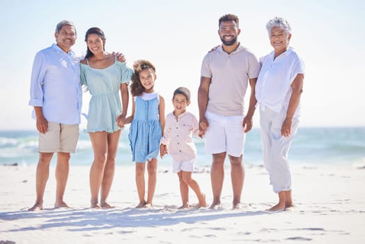 Big family, grandparents portrait or happy kids at sea holding hands to relax on holiday together. Dad, mom or children siblings love bonding or smiling with grandmother or grandfather on beach sand.