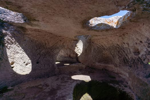 Ancient cave city. Inside the cave, view from the window