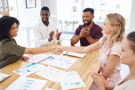 Handshake, clapping and business women in meeting celebration, success or thank you for financial profit or data. Teamwork, diversity and people shake hands in collaboration, thanks and project bonus.