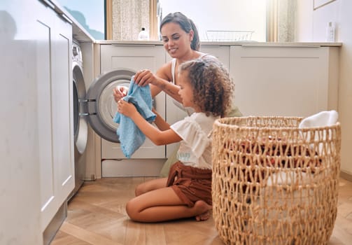 Happy, laundry and washing machine with mother and daughter for helping, learning and cleaner. Housekeeping, teamwork and basket with woman and young girl in family home for teaching and cleaning.