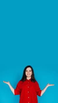Young Woman Promoter Holding Hand Scales - Solutions, Comparisons, and Measurements - Advertising Concept - Isolated on Blue Background. Compare, Measure, and Advertise.
