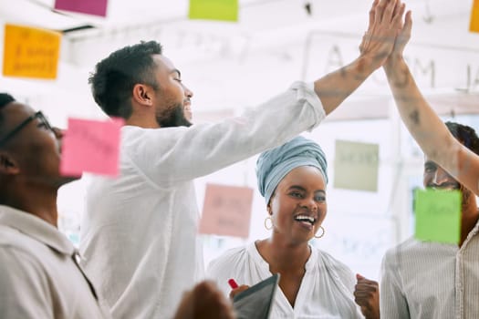 High five, brainstorming and business people for success, teamwork or collaboration of winning goals in support. Yes, team celebration and happy women, men or hands together for target on glass wall.