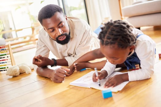 African father, girl and floor for drawing, paper and learning together with help, love and care in home lounge. Black man, daughter and teaching with toys, notebook and helping hand in family house.