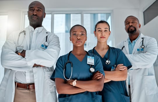 Group, doctors and portrait with arms crossed, hospital or teamwork for solidarity, women and men for healthcare. Nurses, team and people with diversity, medical collaboration and serious in clinic.