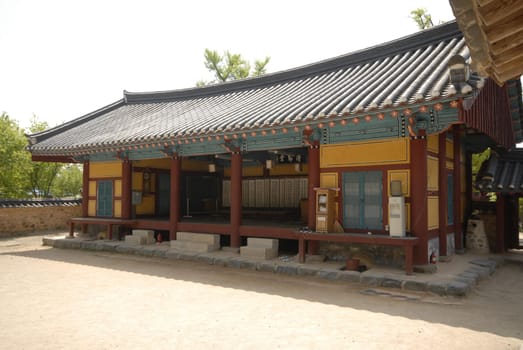 sky,tree,facade,building,property,temple,wood,window,leisure,architecture,cottage,home,house,roof,shrine