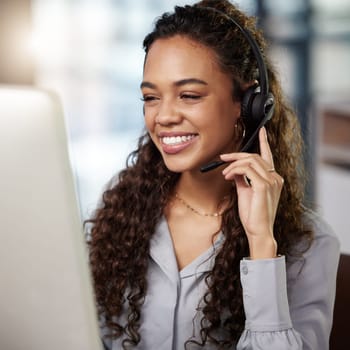 Young woman, call center and listen with computer, microphone and smile for telemarketing job. Happy female consultant, face and pc headphones for customer service, technical support or crm at agency.