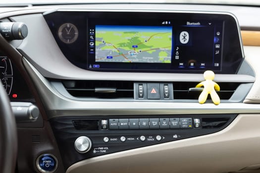 Car air conditioning button inside a car. Modern car climate control panel for driver and passenger with shallow depth of field. Zone climate control. Car interior detail.