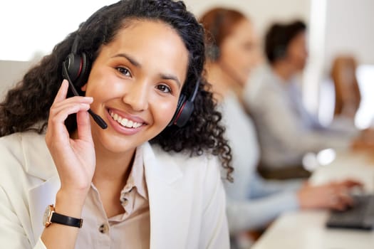 Business woman, call center and portrait with a smile of phone consultation and web support. Consulting, happiness and office of a customer service, contact us and telemarketing employee at company.