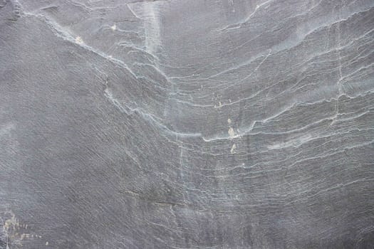 Gray granite texture on the wall.