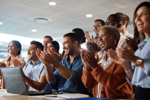 Applause, support and success with a business team clapping as an audience at a conference or seminar. Meeting, wow and motivation with a group of colleagues or employees cheering on an achievement.