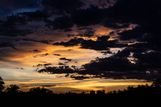 Evening sky sunset.  big puffy cumulus and long stratus clouds. sky background with clouds