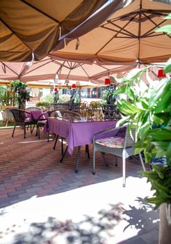 summer cafe on a sunny summer day. table under the canopy of a summer cafe.