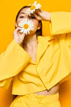 woman flower person female care young yellow happiness joy pretty joyful chamomile portrait face natural smile nature model concept love cheerful